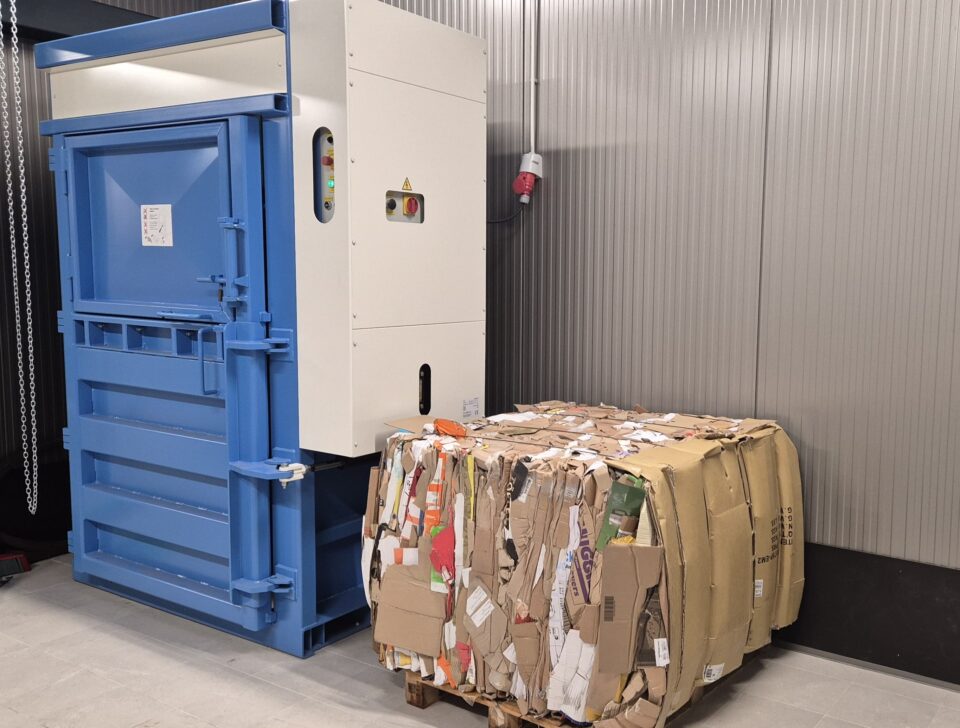 Vertical baler for packaging materials