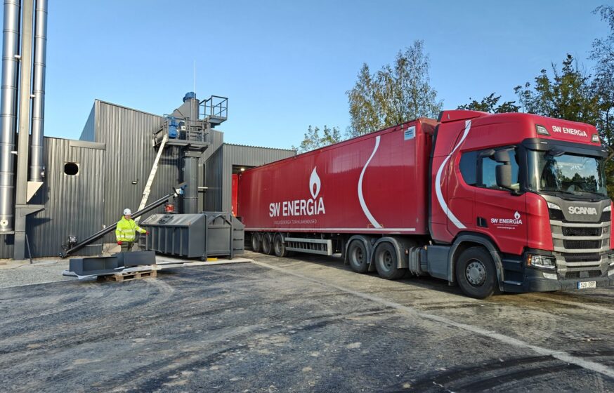 Biomass fuel unloading from truck at district heating boiler plant