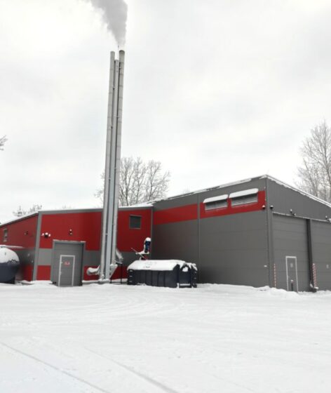 Completed district heating boiler plant with chimney and auxiliary buildings