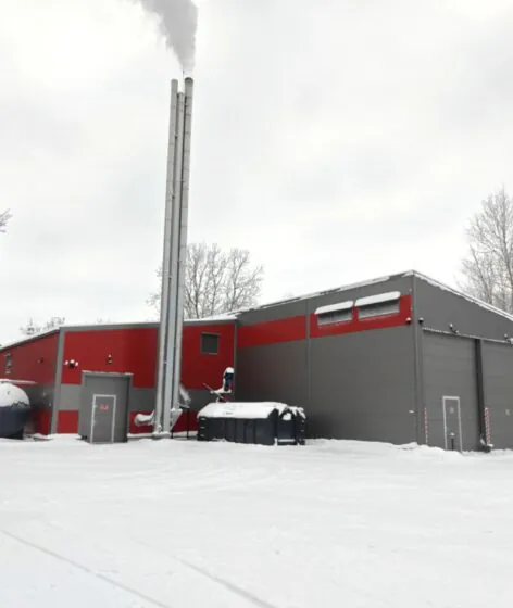 Completed district heating boiler plant with chimney and auxiliary buildings