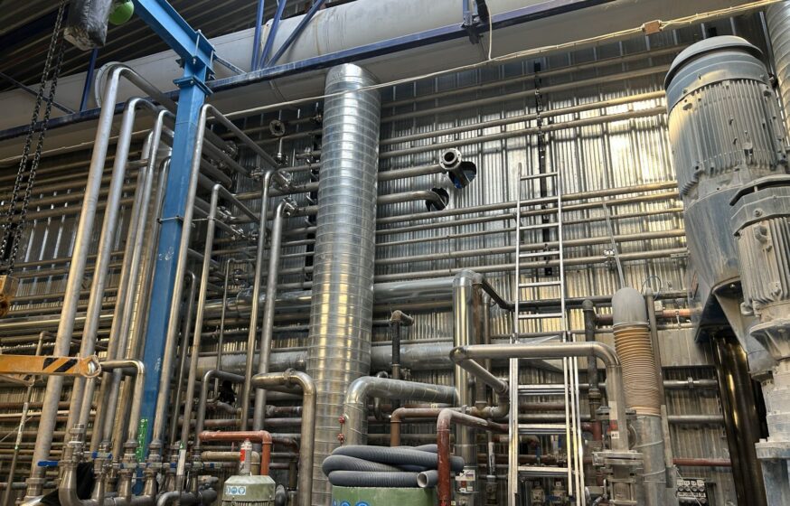 Industrial stainless steel piping system installed in process plant