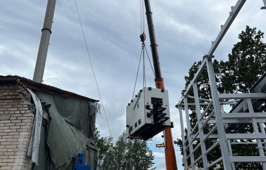 Biomass boiler unit being lifted into position during boiler house installation