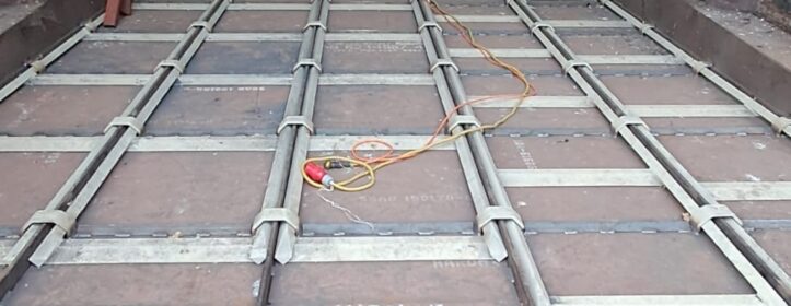 Completed industrial warehouse floor and scraper system installed by Tamult in Austria