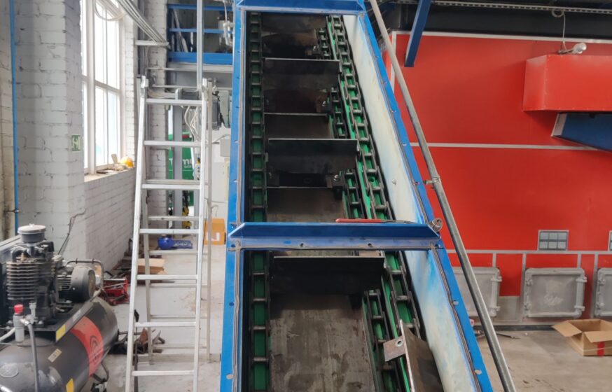 Fuel conveyor maintenance and repair inside boiler plant