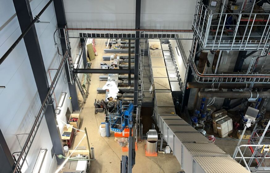 Fuel handling system installation with conveyors and feeding equipment