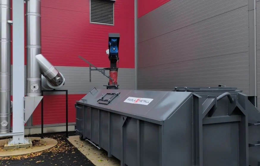 Ash container with screw conveyor and level sensor installed at Aravete biomass boiler house